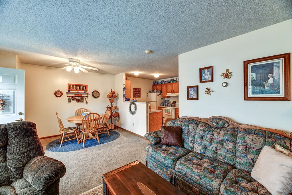 a living room with a couch and a table