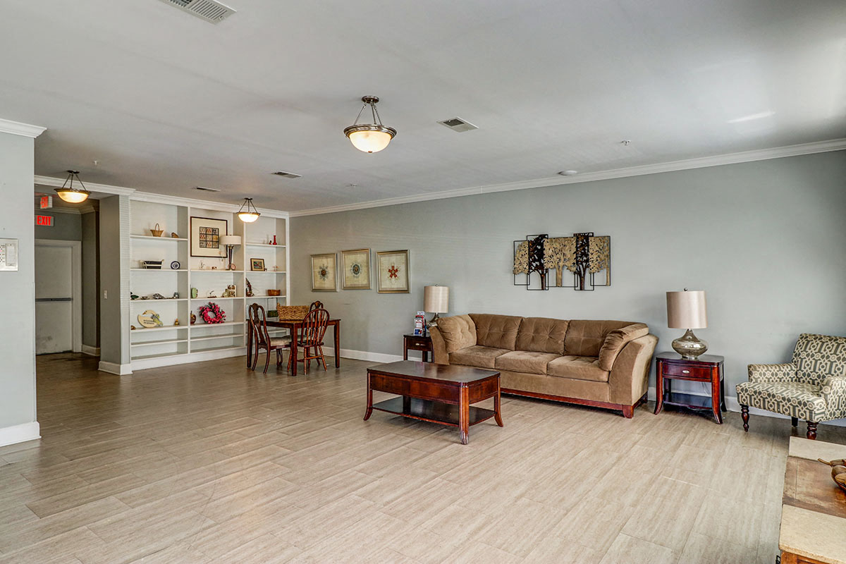 a living room with a couch and a table
