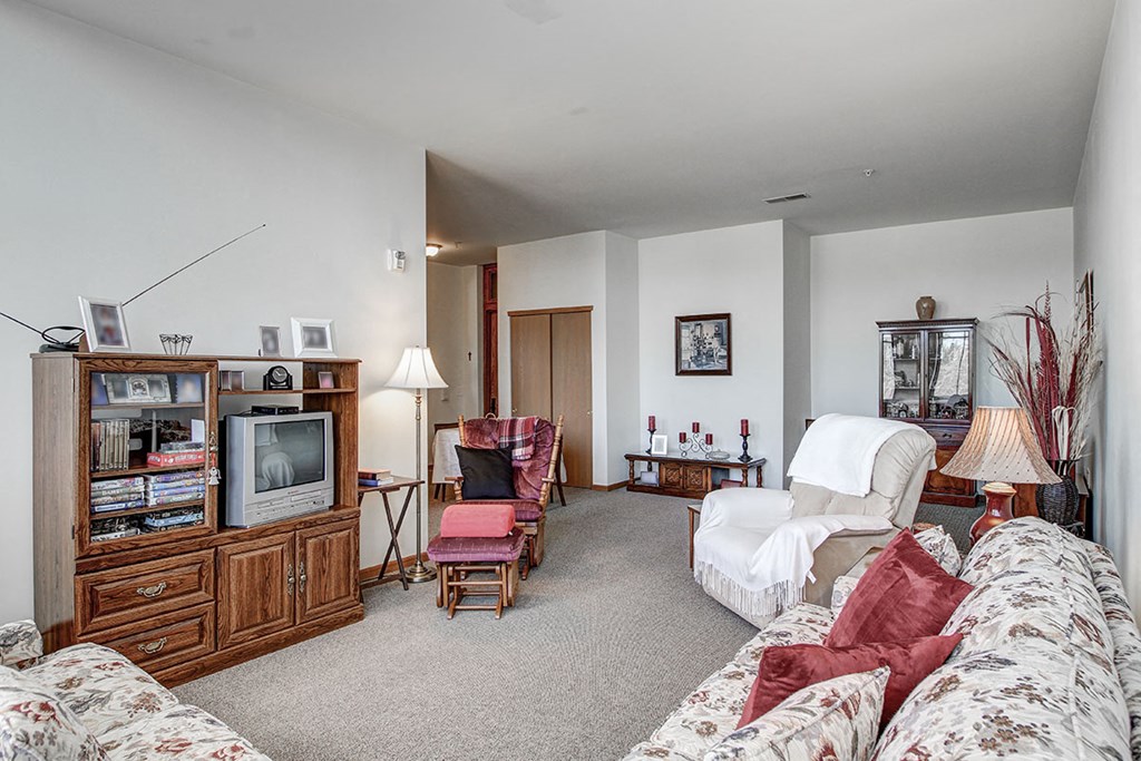 a living room with a couch and a tv