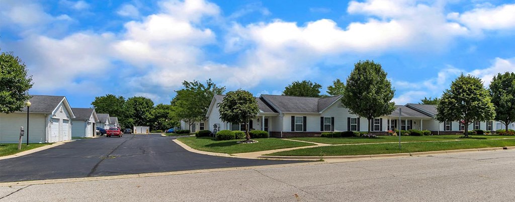 a row of houses on the side of a street