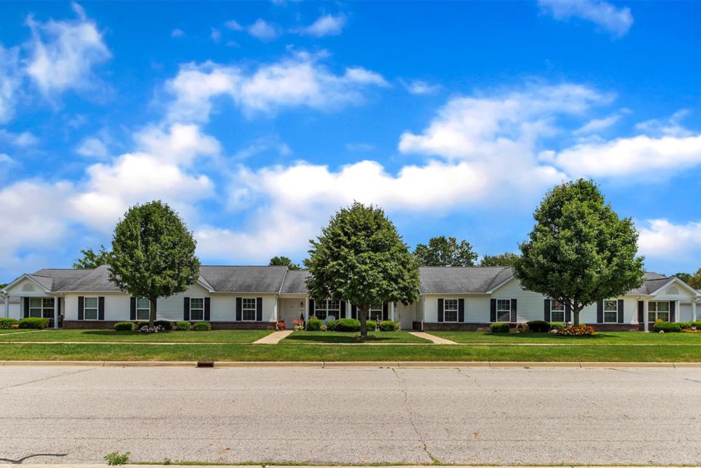 a row of houses on the side of a street