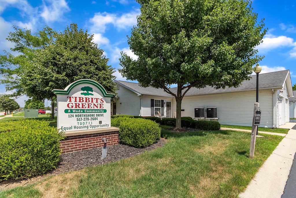 a building with a sign in front of it