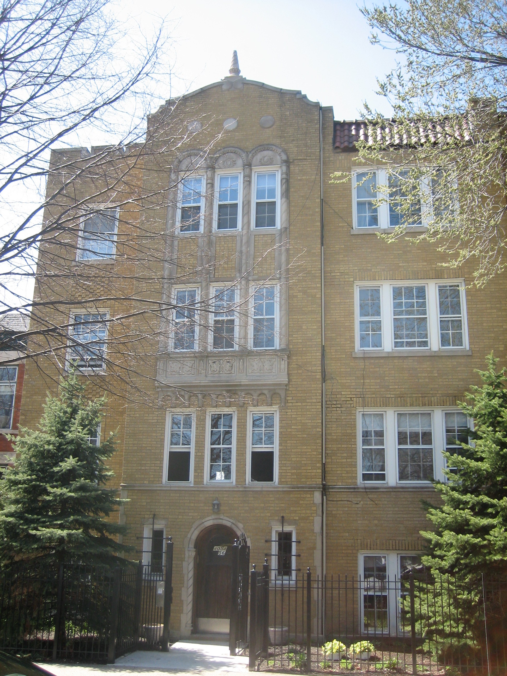 a large brick building with a tower on top of it