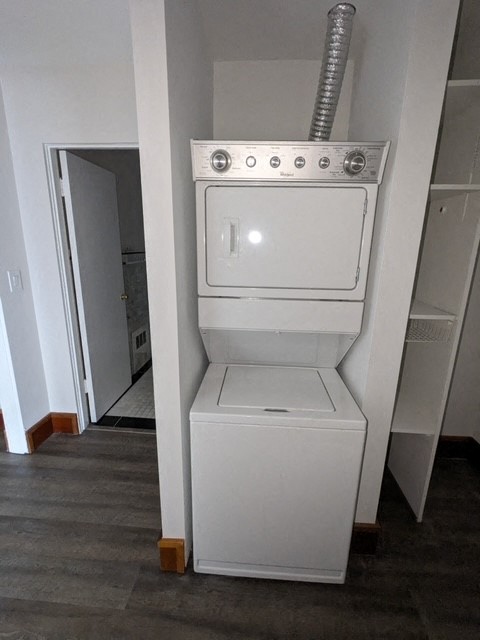 a white washing machine and dryer in a room