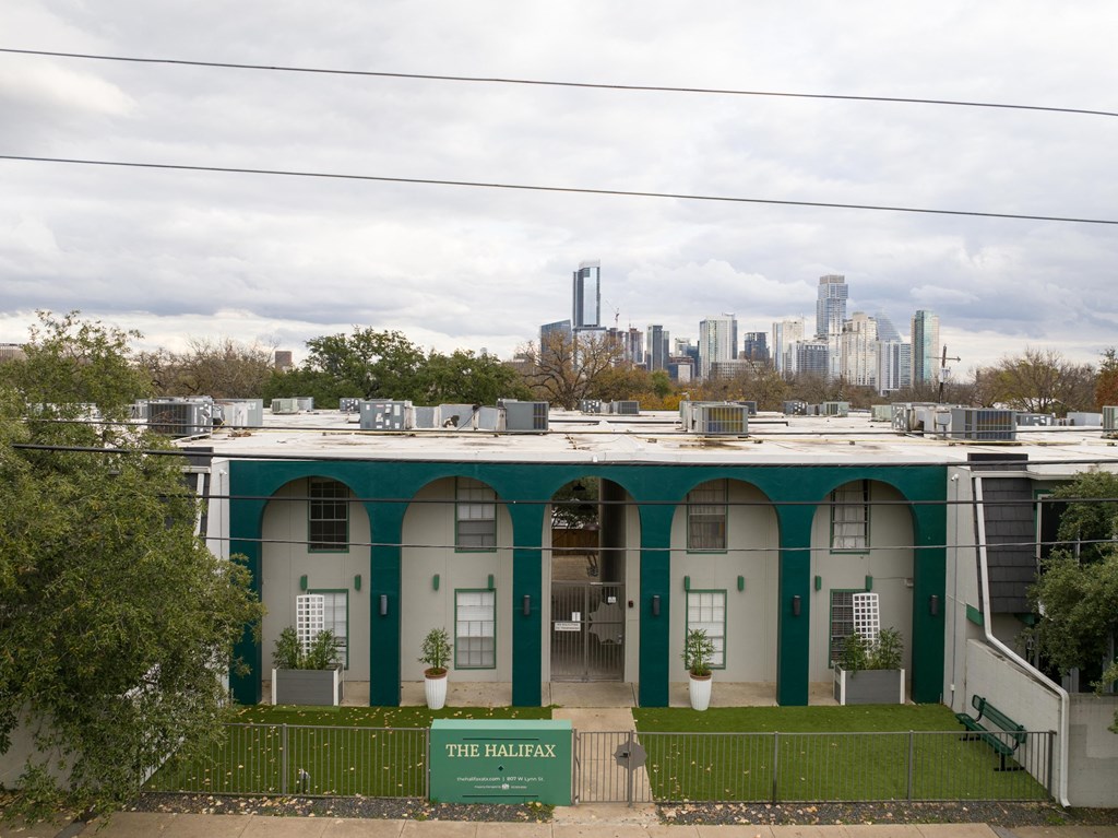 the building has a view of the city skyline