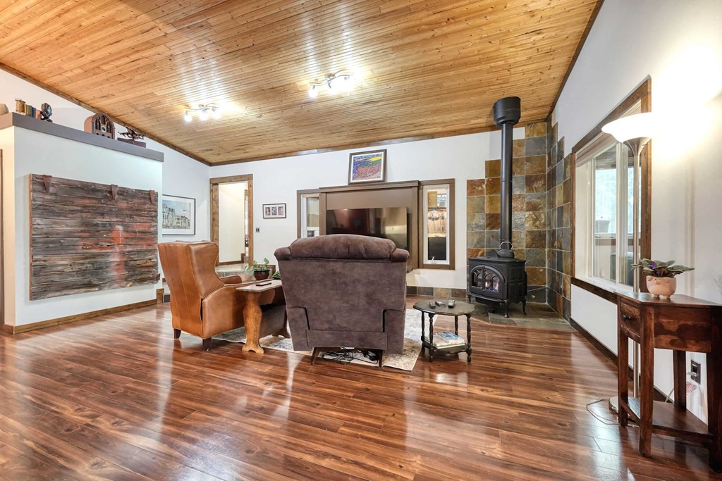 a living room with a couch and a fireplace