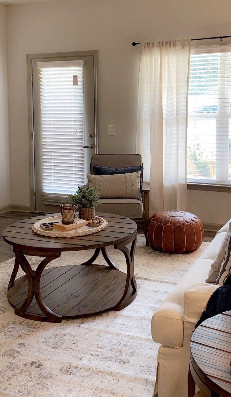 a living room with a couch and a coffee table