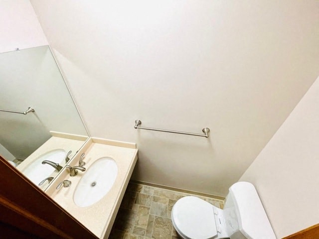 a bathroom with a sink and a toilet