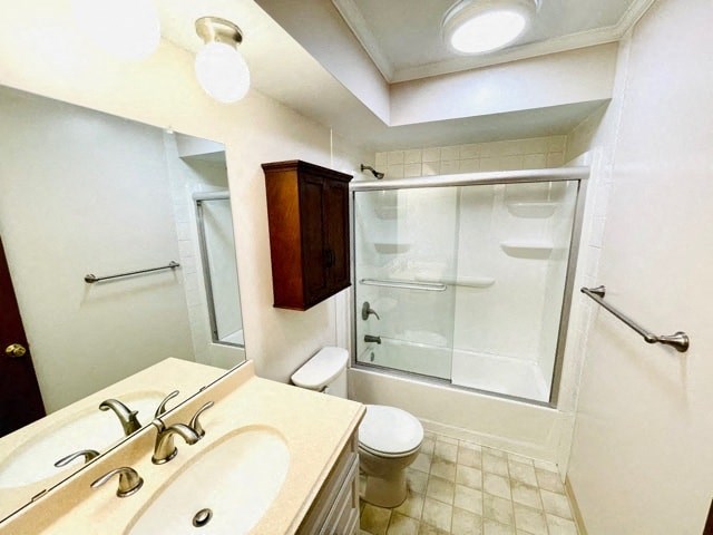 a bathroom with a sink and a shower and a toilet