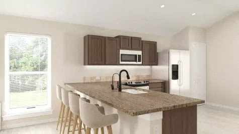 a kitchen with a marble counter top