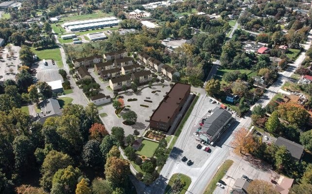 an aerial view of a parking lot in a city