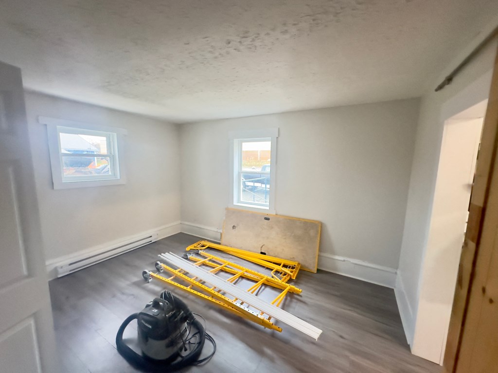 the living room is being remodeled and is being prepared for moving into the house