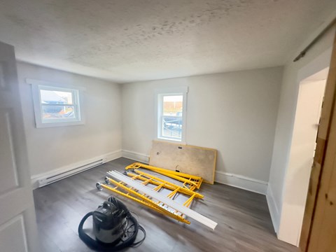 the living room is being remodeled and is being prepared for moving into the house