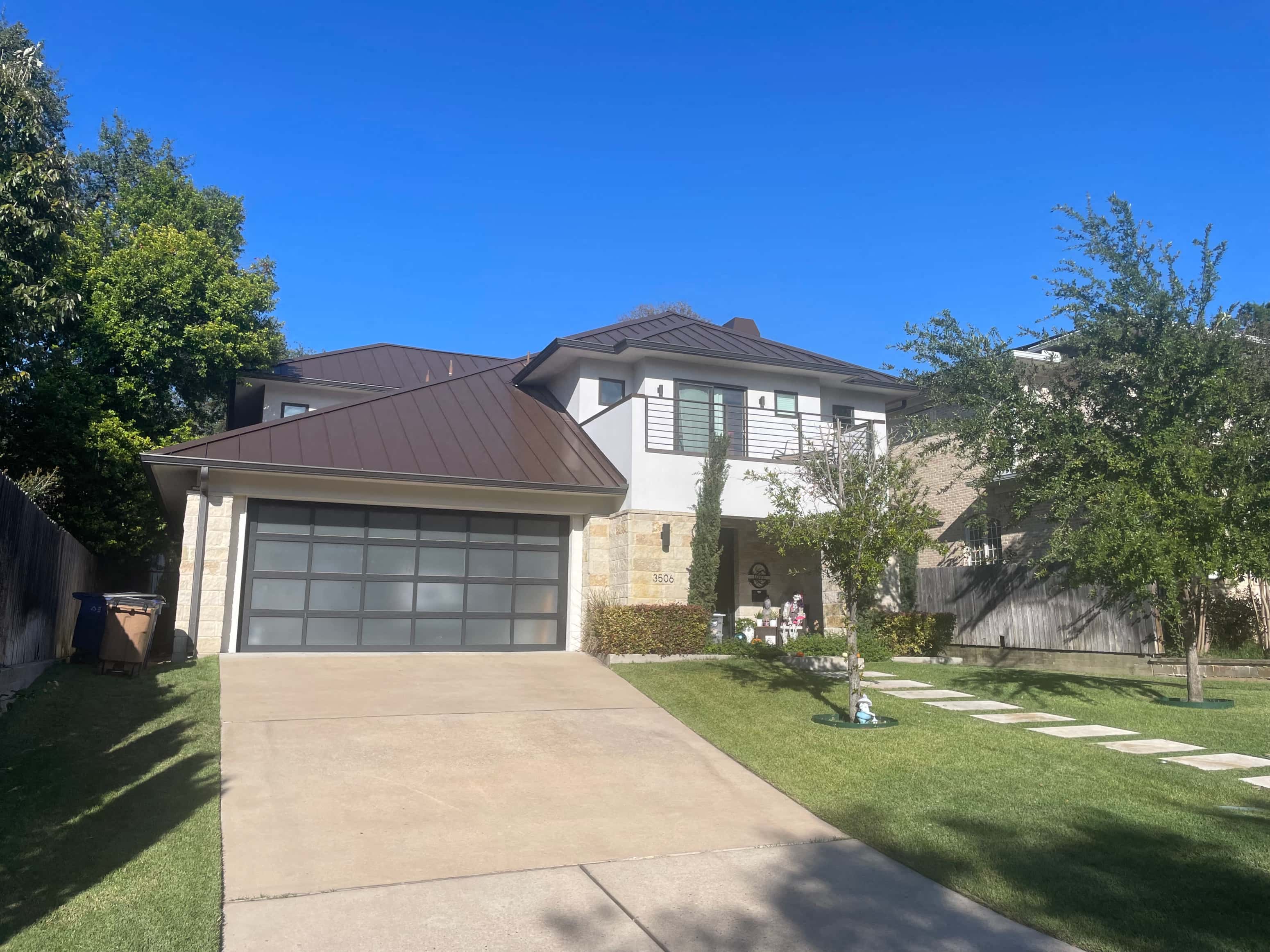 a house with a driveway and a garage door