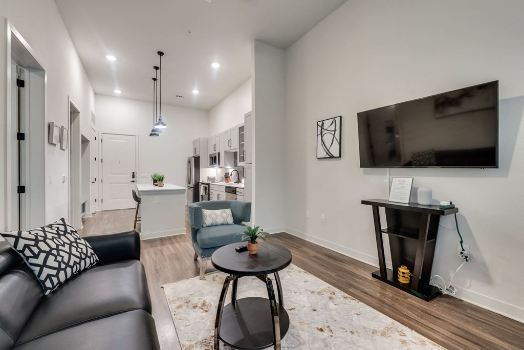 a living room with a couch and a table