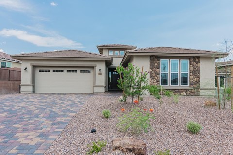 a house with a driveway and a garage door