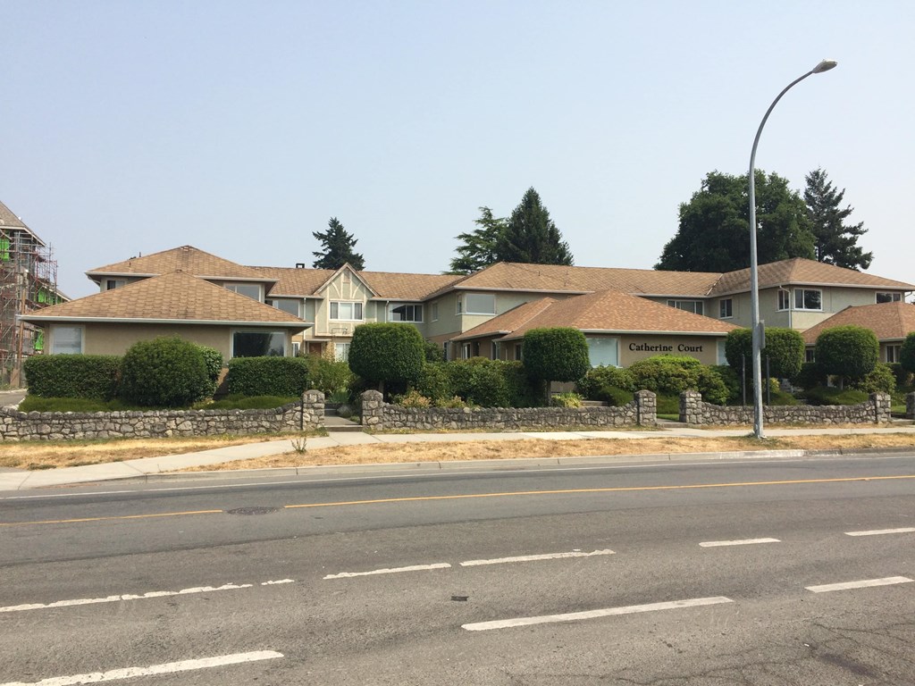 a house on the side of a street