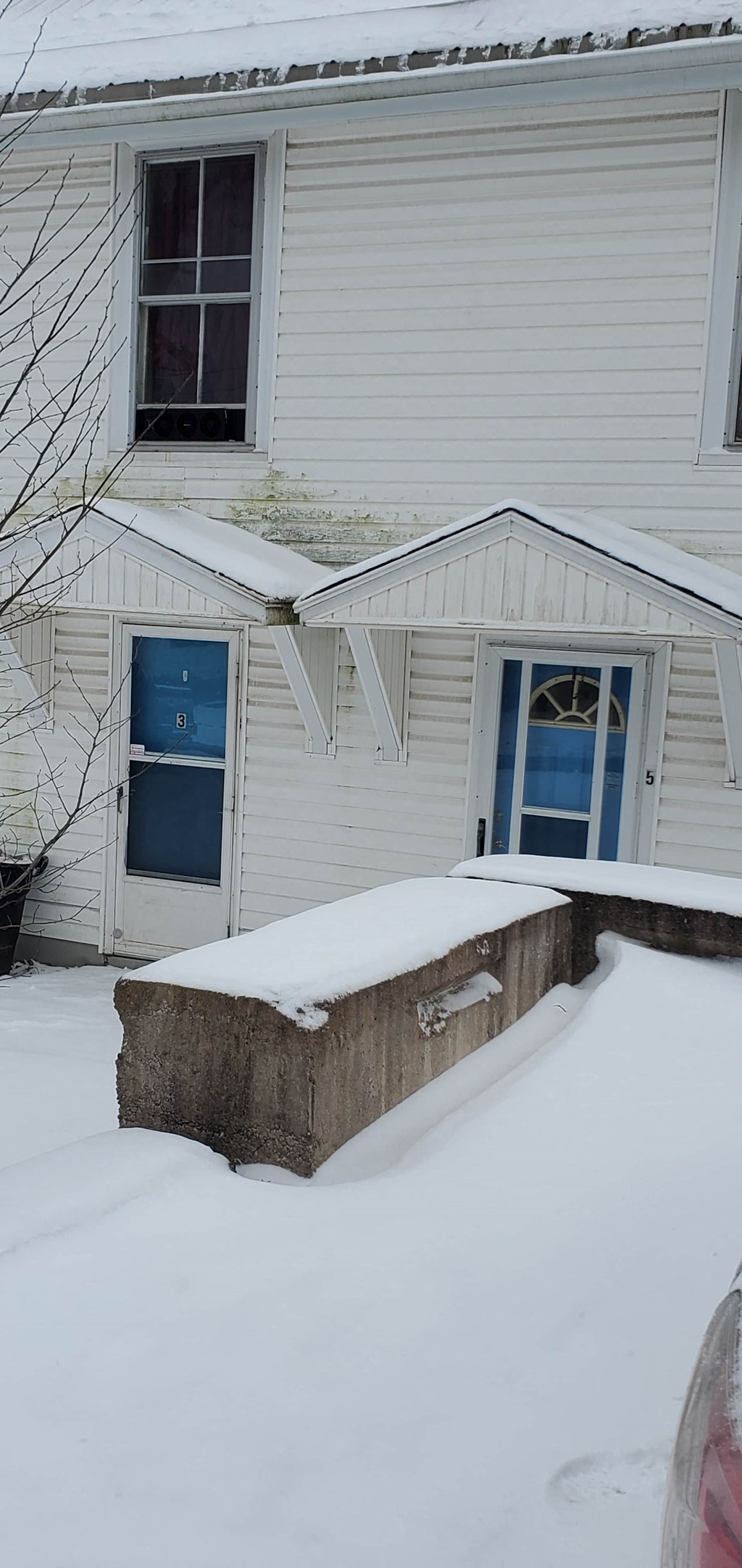 a house with snow on the ground