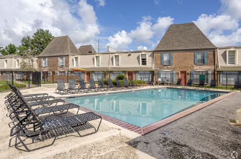 our apartments offer a swimming pool with chaise lounge chairs