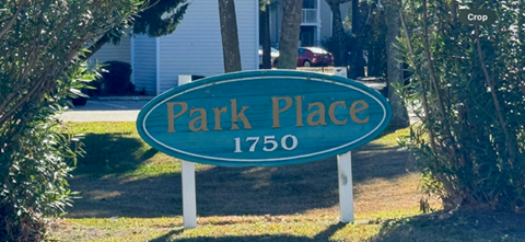 a park place sign in front of a house