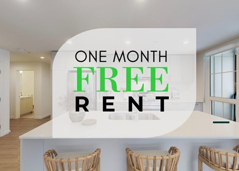 A kitchen with a sign that says "One Month Free Rent".