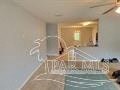 a house with a swimming pool and a staircase