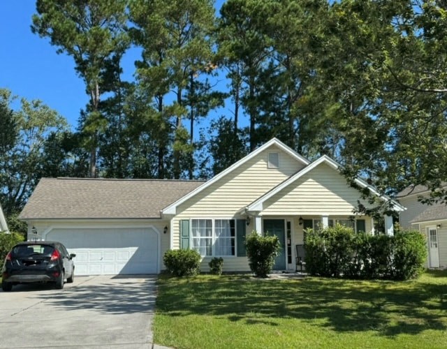 a house with a car parked in the driveway