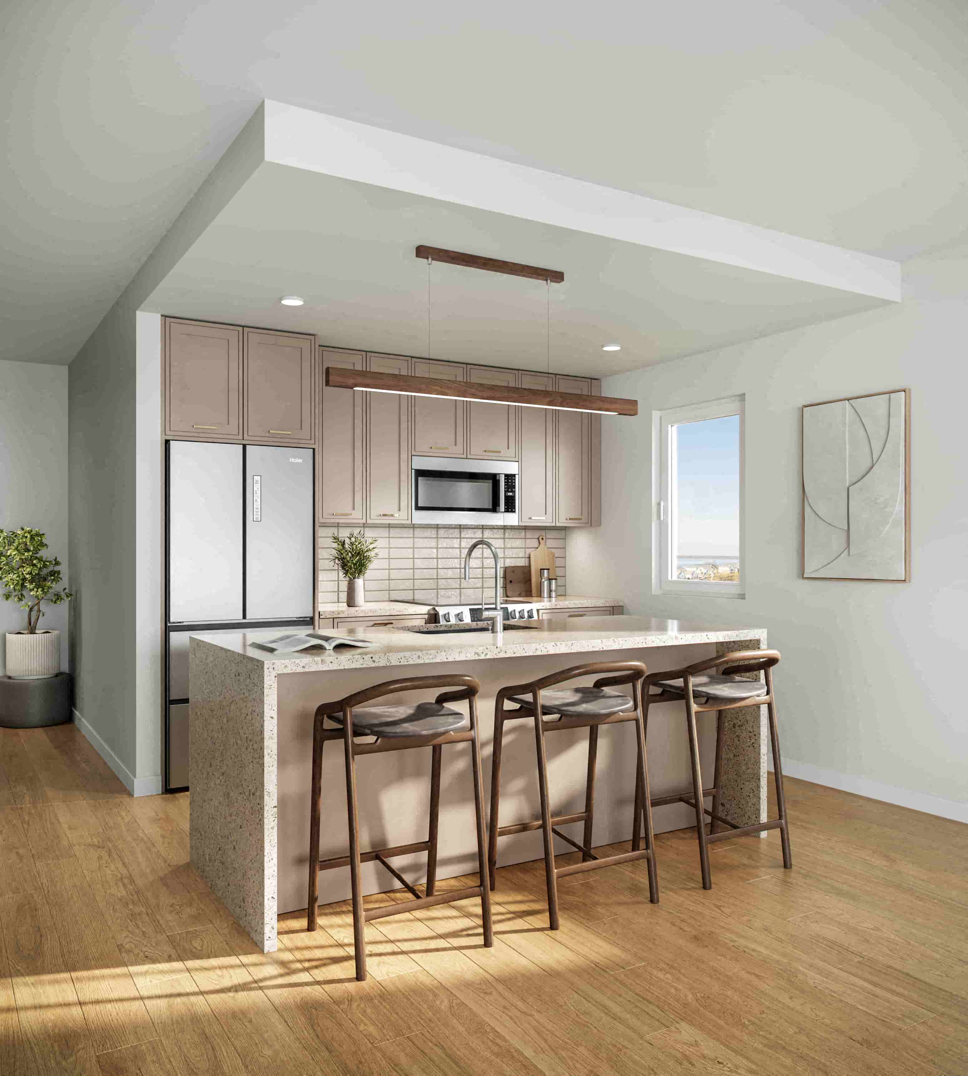 A modern kitchen with a bar stool and a countertop.