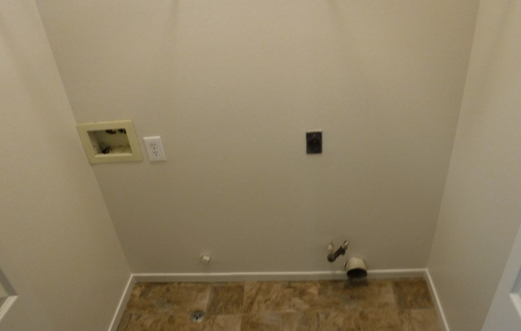 the wall in the living room is primed and ready to be painted