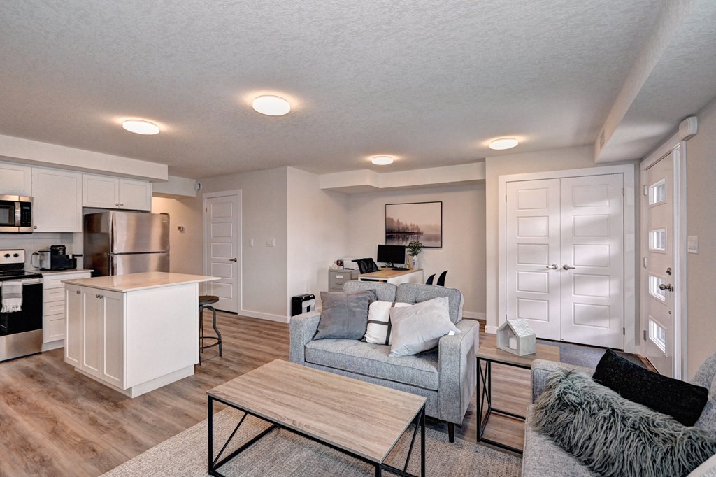 a living room with a couch and a table