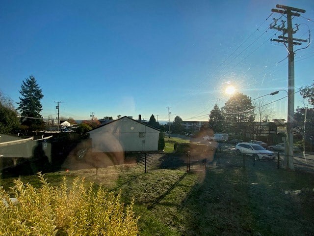 a reflection of a house in a window