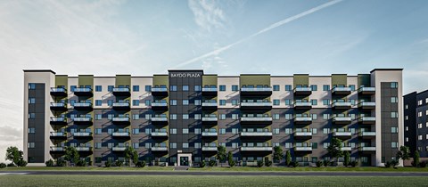 A modern apartment building with the name "Bayto Plaza" on the front.
