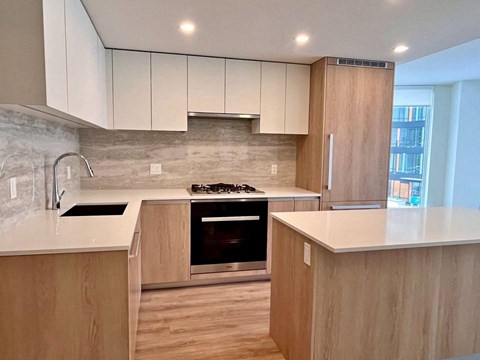 a kitchen with a stove and a counter top