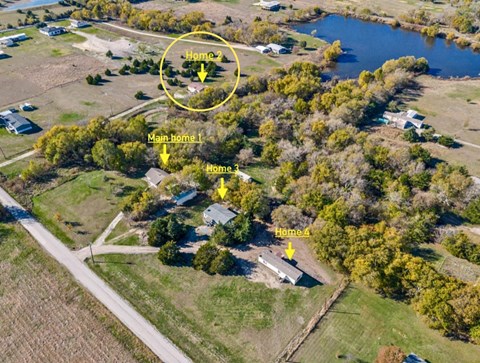 an aerial view of the property and its surroundings