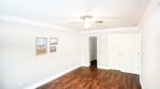 a empty room with a door in the middle of it