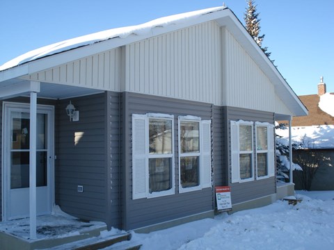a with white siding and white windows