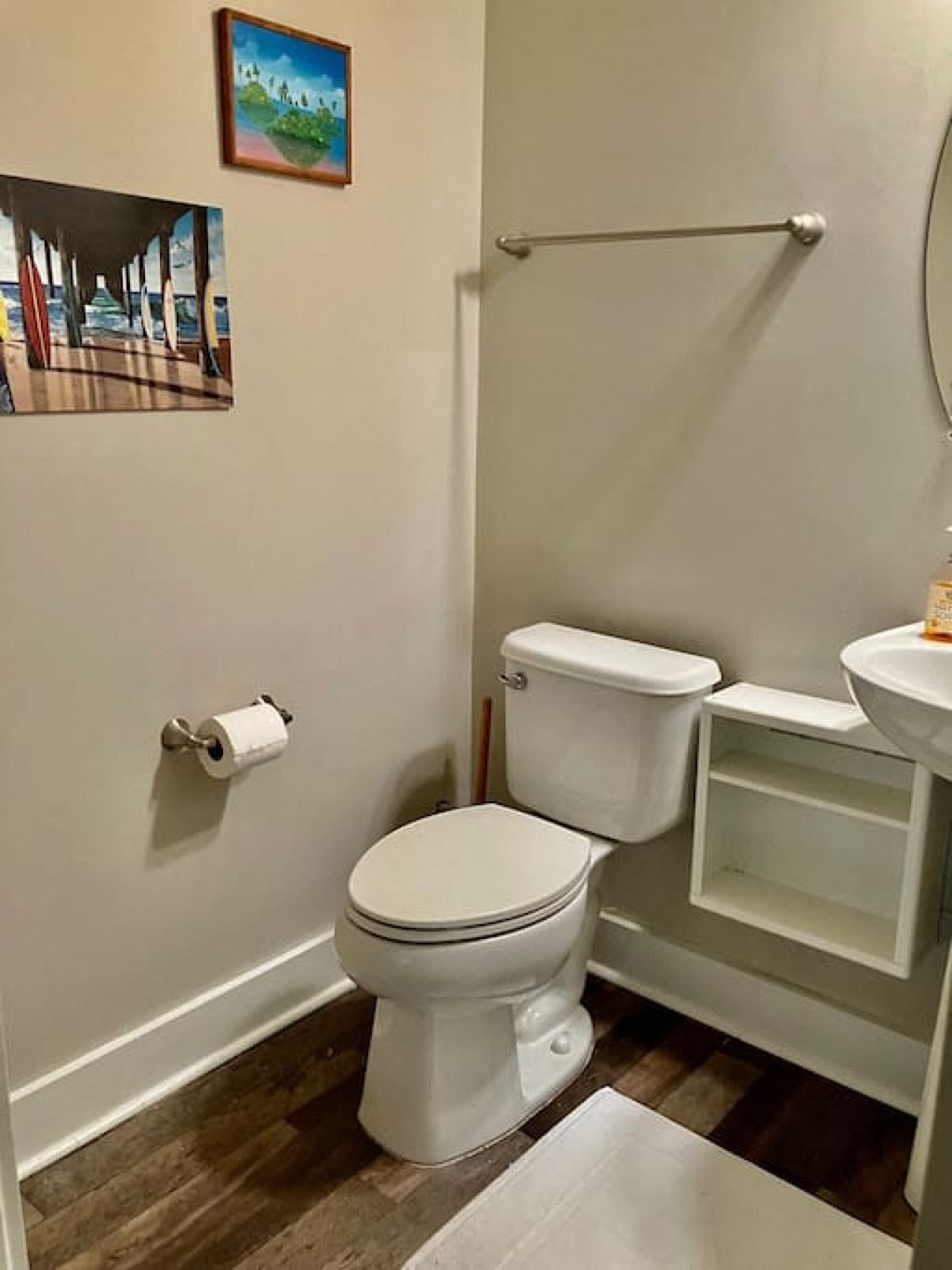 a bathroom with a toilet and a sink
