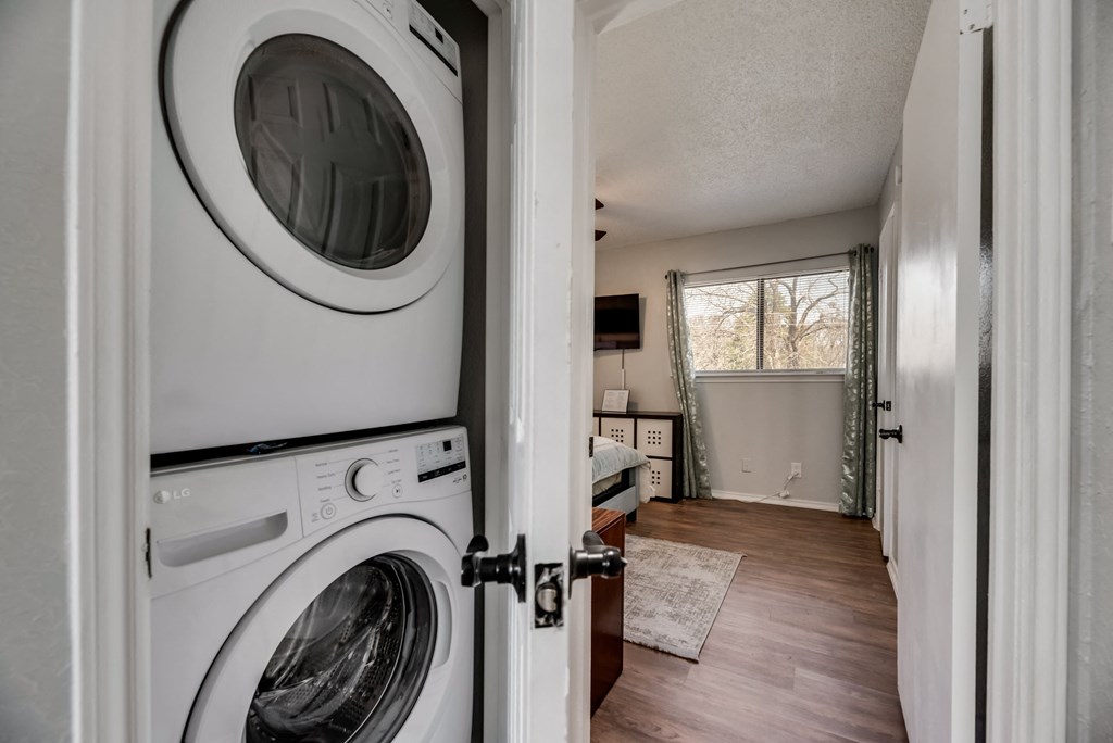 a laundry room with a washer and a dryer in it