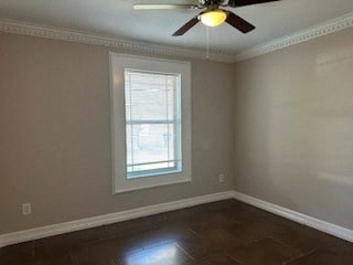 a empty room with a ceiling fan and a window