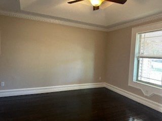 a empty room with a ceiling fan and a window