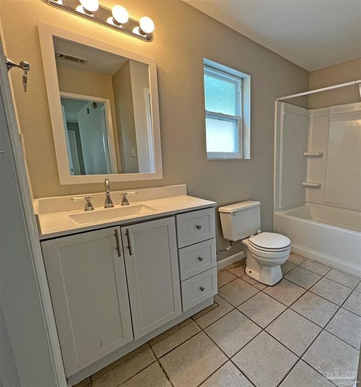 a bathroom with a sink toilet and a mirror