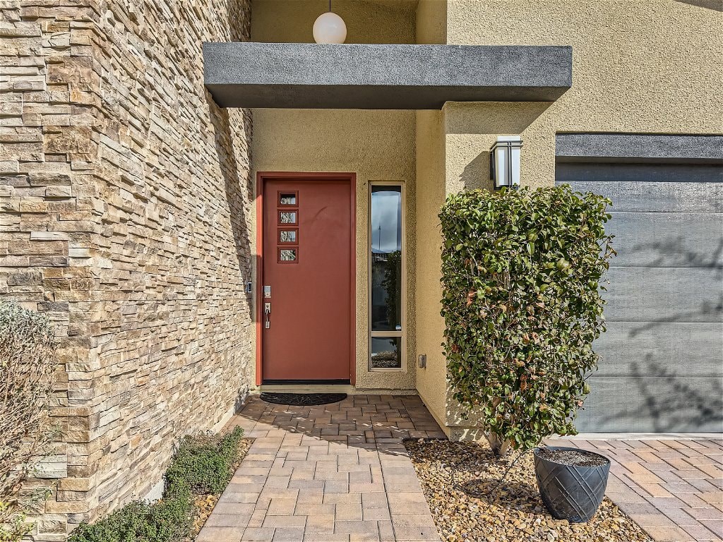 the front door of a home with a red door