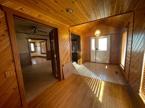 a view of the living room and dining room from the entryway