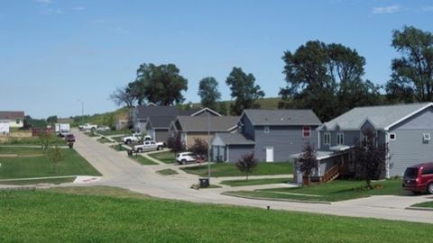 a street of houses in a suburban neighborhood