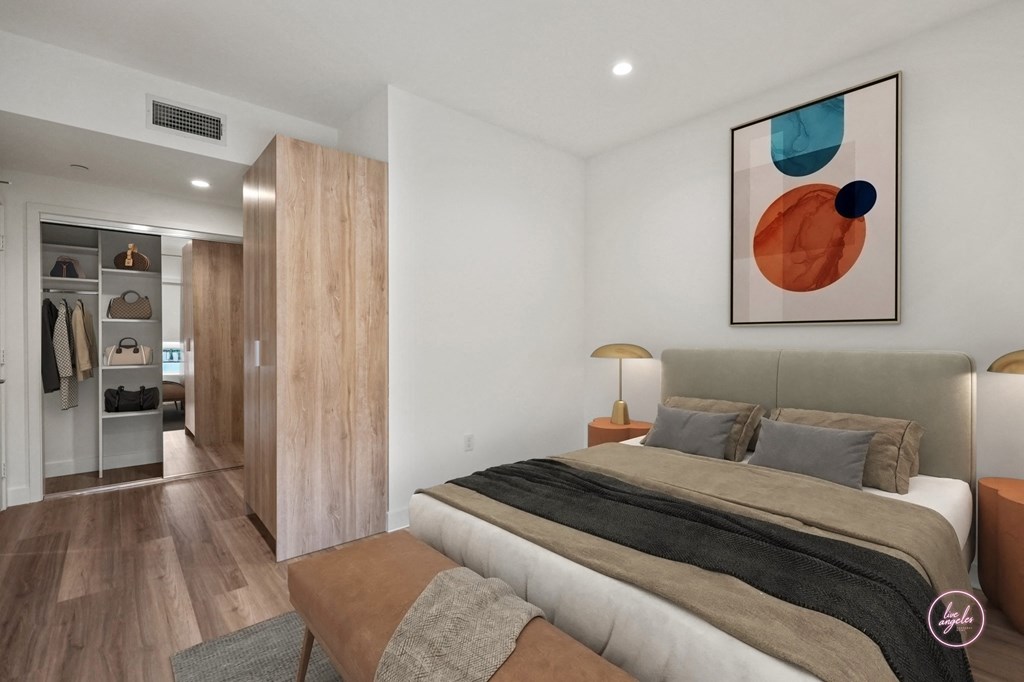 a bedroom with a bed and a closet