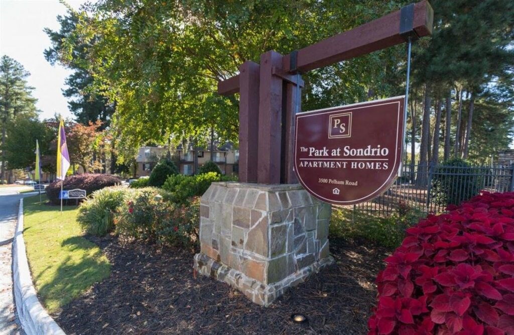 a sign for the park at santorum park homes