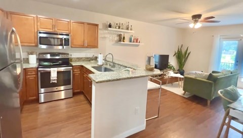 a kitchen with an island in the middle of it