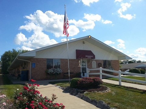 a building with an flag in front of it