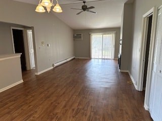 A room with a ceiling fan and wooden flooring.