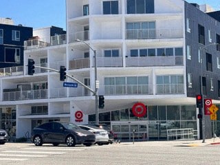 a building with cars parked in front of it